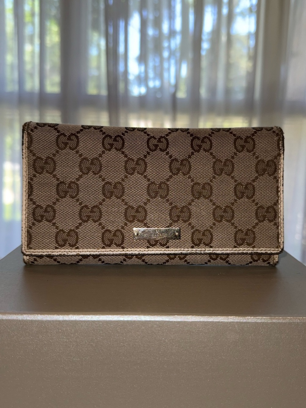Gucci Brown GG Supreme Flap Wallet with Metal Plaque